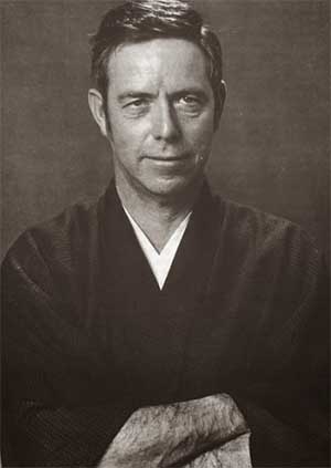 Pictured above the belt, standing Alan Watts in kimono