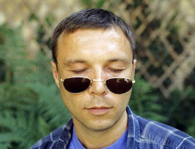 Viktor Pelevin in sun glasses with eyes closed